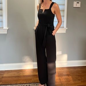 Daytrip size small dressy black jumpsuit.  Used once - like new!